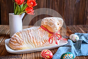 Classic Easter lamb pound cake sprinkled with powdered sugar