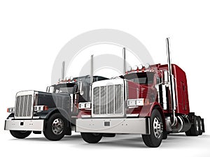 Classic eighteen wheeler trucks in metallic gray and red colors