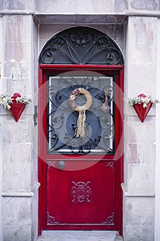 Classic facade with red vintage door