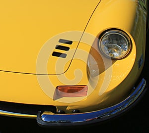 Classic Ferrari sports car headlamp and vent