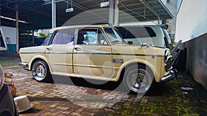 Classic Fiat 1200 granluce in a parking lot