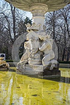 Classic fountain in the Retiro park , Madrid Spain