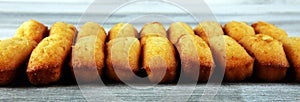 Classic French Madeleines cookies. Madeleines served on table
