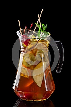 Classic fresh juices from fruits and vegetables on a black background in glass cups, cocktails. Drinks with bottom ejection.