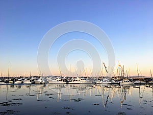 A classic full view of a marina full of boats around sundown in Sidney, Vancouver Island, British Columbia, Canada.