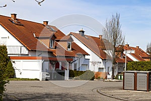 Classic german residential houses with orange roofing tiles and