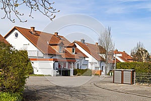 Classic german residential houses with orange roofing tiles and