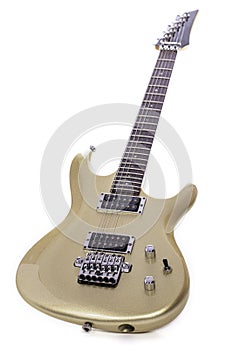 Classic gold electric guitar isolated against white background