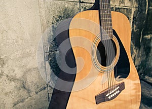 Classic guitar with grunge background