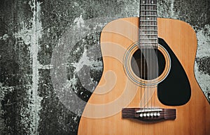 Classic guitar with grunge background