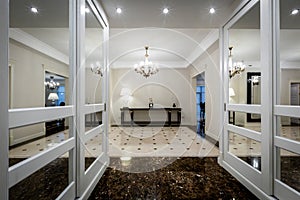 Classic hallway interior with mirrored cabinets