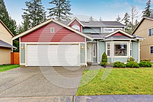 Classic house with garage and driveway.