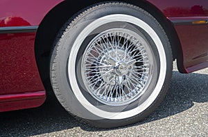 Classic hubcap on vintage car