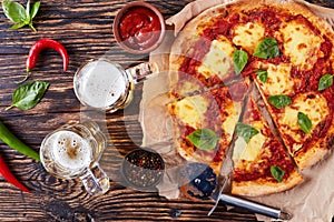 Classic italian Pizza Margherita with beer