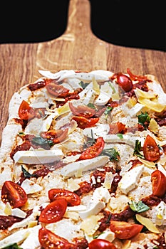 classic Italian pizza with mozzarella, tomatoes and basil