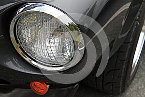 Classic italian sports car headlamp