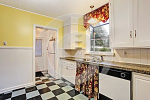 Classic kitchen room interior with white cabinets, granite counter top