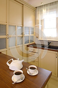 Classic Kitchen with Teapot And Cups