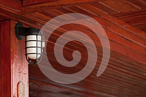 Classic lamp with wooden background