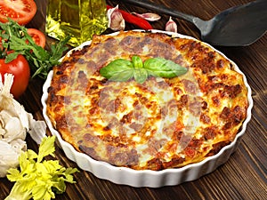 Classic Lasagne - Fast Food on wooden Background