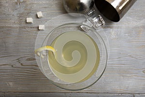 Classic Lemon Drop Martini cocktail with shaker