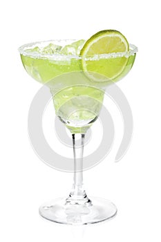 Classic margarita cocktail with lime slice and salty rim