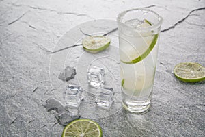 Classic margarita drink with lime and salt