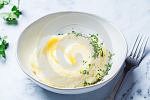 Classic mashed potatoes with butter and herbs