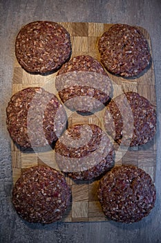 Classic meat of GamBurger on Wooden Board