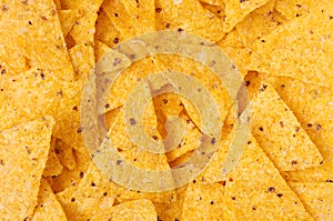 Classic mexican snack - nachos background, top view.