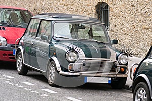 Classic Mini Cooper with carlashes