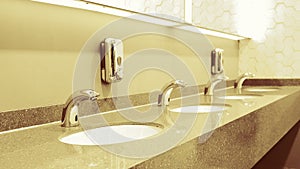 Classic modern washbasins with chrome touch water tap and soap dish