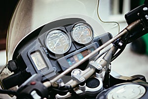 Classic motorbike control panel, close up picture, road trip concept