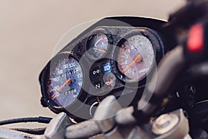 Classic motorbike control panel at rain