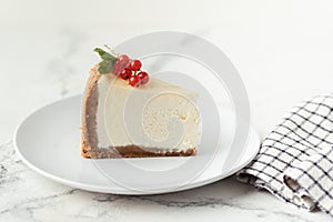 Classic New York cheesecake in the white plate