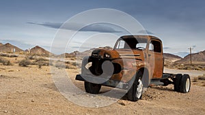 Classic Old Car decays in a meadow.