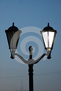 Classic old-fashioned lamps on a lamppost