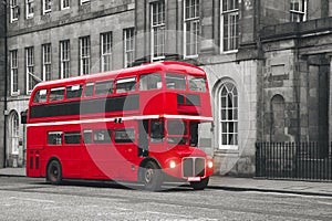 Classic Old Red Double Decker Bus in street of Edinburgh
