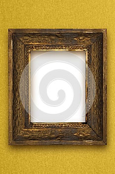Classic old wooden picture frame carved by hand gold wallpaper