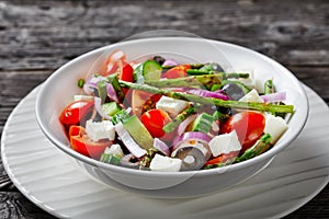 Classic organic greek salad with grilled asparagus