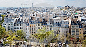 Classic Parisian buildings. Aerial view of roofs. Panorama