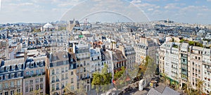 Classic Parisian buildings. Aerial view of roofs. Panorama