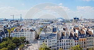 Classic Parisian buildings. Aerial view of roofs. Panorama