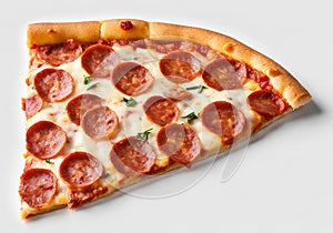 Classic pepperoni pizza slice on white table background. photo