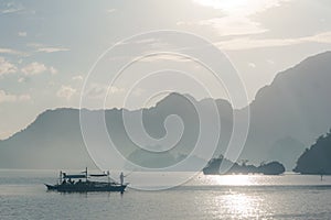 Classic Philippine fishing boat on the background of the sea landscape.