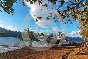 Classic Philippine fishing boat on the background of the sea landscape.