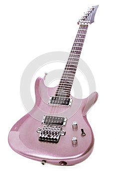 Classic pink electric guitar isolated against white background