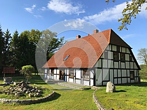 Classic Polish countryside retro house, chequered timber walls