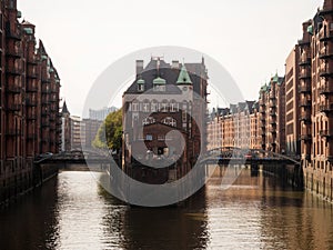 Classic postcard view of Hamburg Speicherstadt Wasserschloss warehouse district in Elbe harbour port HafenCity Germany