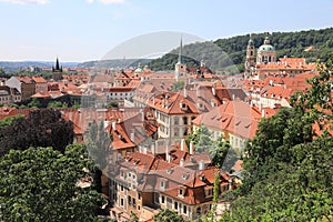 Classic Prague - aerial view to old roof buildings and street ,  Czech Republic